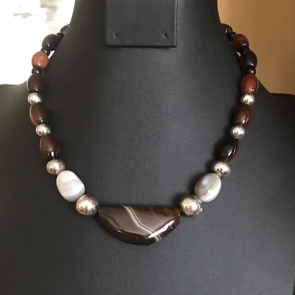 Sterling silver polished stone and bead necklace.